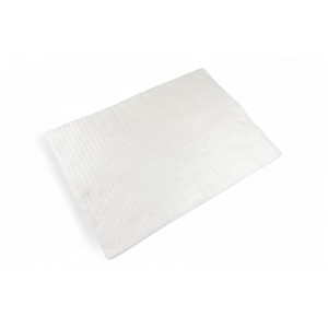 Compressed piece of white needle-punched material 500x350x10mm